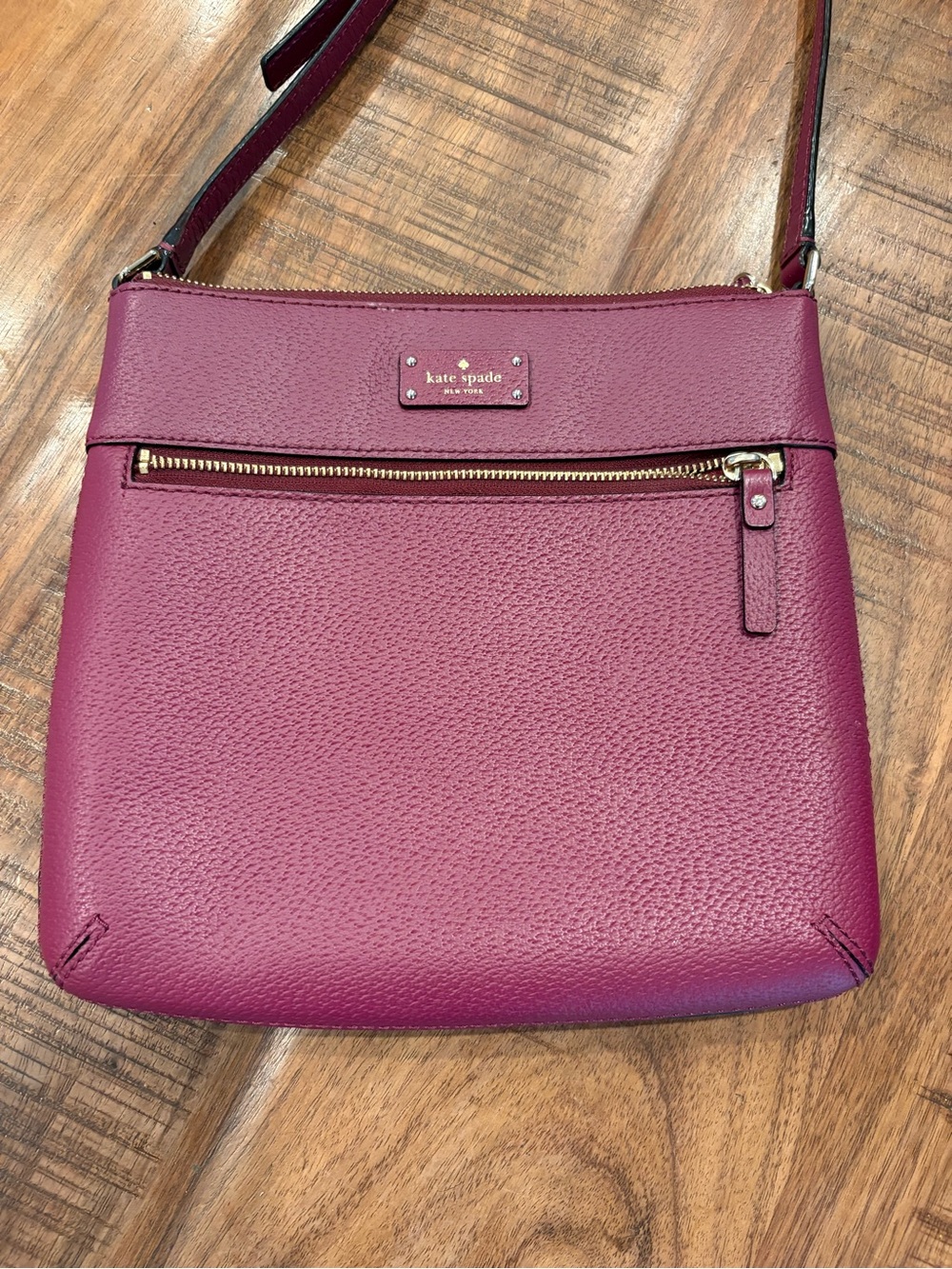 Kate Spade burgundy leather crossbody with gold hardware
